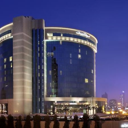 Moevenpick Hotel Khobar Bagian luar foto The hotel at night